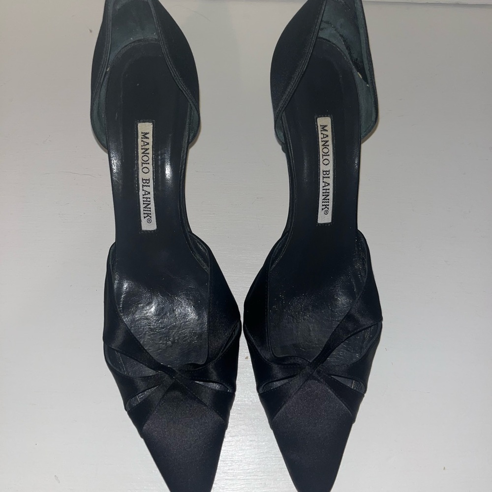 Manolo Blahnik black satin dress shoes.